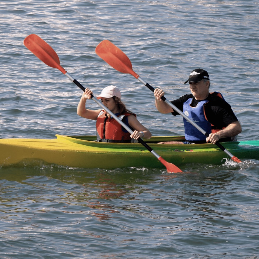 Two people kayaking together on the water