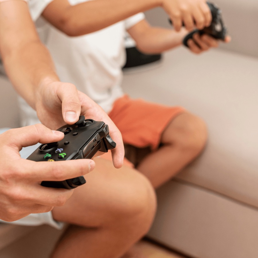 Hands holding a game controller